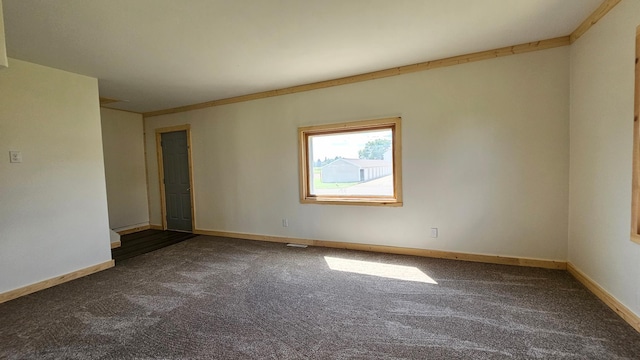 1402 3rd St NE, Staples, MN 56479 - carpeted empty room featuring baseboards