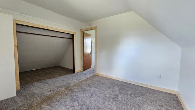 1402 3rd St NE, Staples, MN 56479 - unfurnished bedroom featuring lofted ceiling, carpet flooring, and a closet