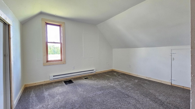 1402 3rd St NE, Staples, MN 56479 - bonus room with a baseboard radiator, vaulted ceiling, and carpet