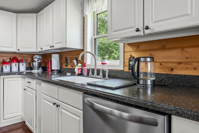 17053 490th St, Shamrock Twp, MN 55760 - kitchen with dishwasher, white cabinetry, and dark countertops