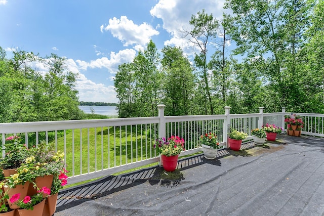 17053 490th St, Shamrock Twp, MN 55760 - wooden terrace with a water view and a lawn