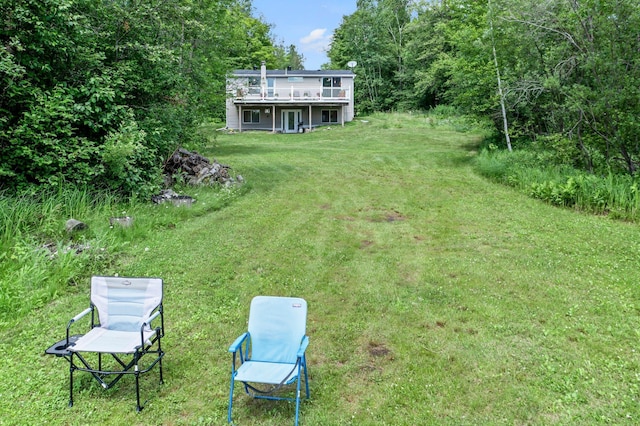 17053 490th St, Shamrock Twp, MN 55760 - view of green lawn featuring a deck