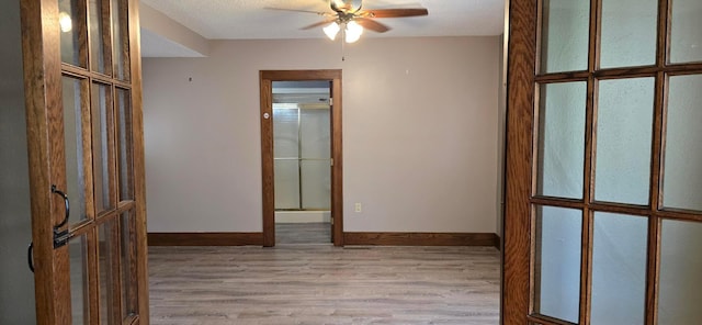 309 5th St SW, Austin, MN 55912 - unfurnished room with light wood finished floors and a ceiling fan