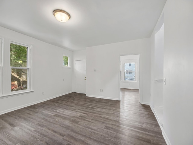 587 Elfelt St, Saint Paul, MN 55103 - unfurnished room featuring dark wood-style floors and baseboards