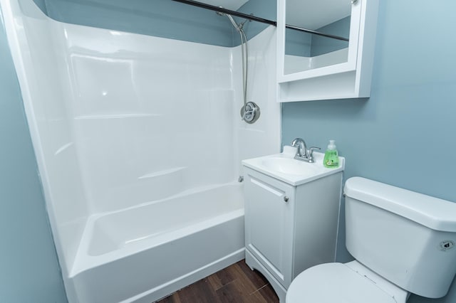 1210 9th St NE, Austin, MN 55912 - bathroom featuring vanity, wood finished floors, and shower / tub combination