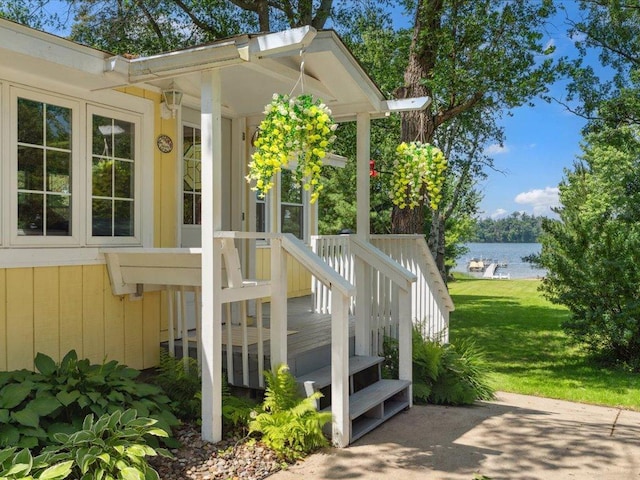 26713 Pelican Beach Rd, Lake Edward Twp, MN 56465 - wooden terrace with a water view and a yard