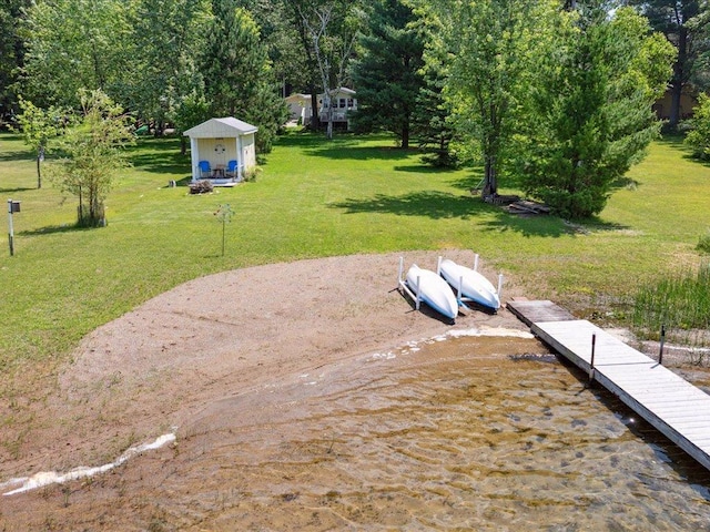26713 Pelican Beach Rd, Lake Edward Twp, MN 56465 - dock area featuring a lawn