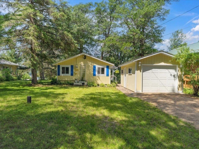 26713 Pelican Beach Rd, Lake Edward Twp, MN 56465 - view of front of property with driveway, a front yard, and a garage