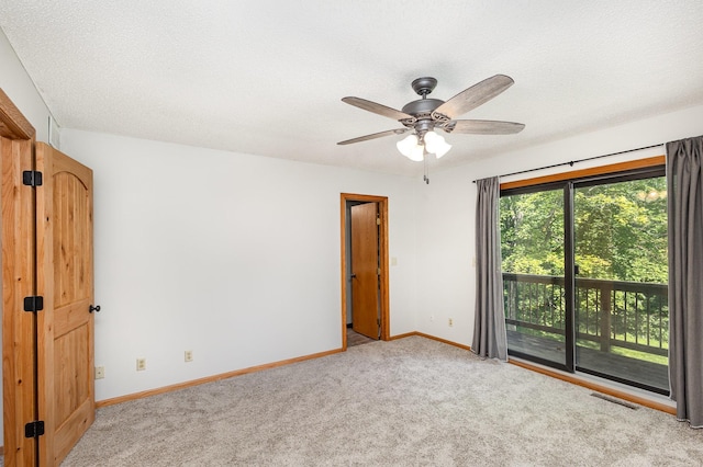 2655 88th Ct W, Northfield, MN 55057 - carpeted empty room featuring ceiling fan and a textured ceiling