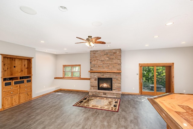 2655 88th Ct W, Northfield, MN 55057 - unfurnished living room with wood finished floors, ceiling fan, a fireplace, and recessed lighting