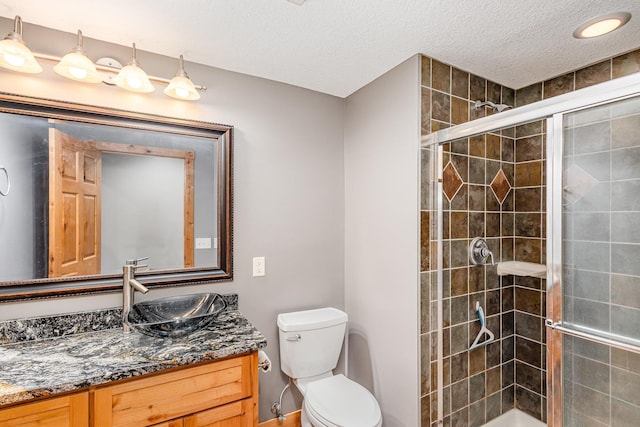 2655 88th Ct W, Northfield, MN 55057 - full bathroom with vanity, a shower stall, and a textured ceiling