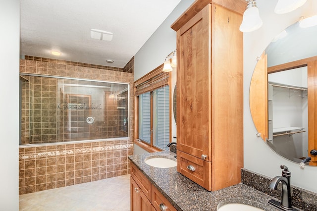 2655 88th Ct W, Northfield, MN 55057 - full bathroom featuring a stall shower, double vanity, and tile patterned flooring