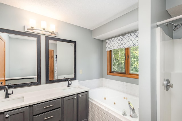 2655 88th Ct W, Northfield, MN 55057 - bathroom featuring double vanity, a jetted tub, and a textured ceiling