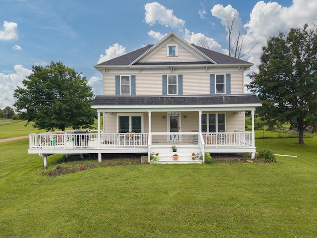 W2741 US Highway 10, Grant Twp, WI 54436 - view of front facade with a front yard, roof with shingles, and covered porch