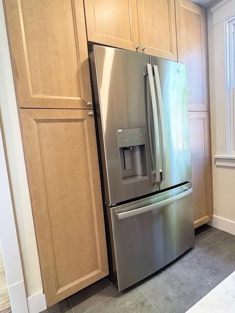 3124 Longfellow Ave, Minneapolis, MN 55407 - kitchen featuring stainless steel fridge and tile patterned floors