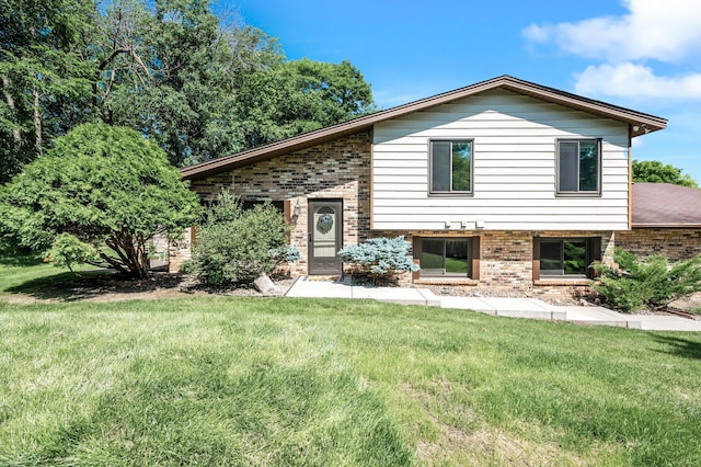 1010 Zanzibar Ln N, Plymouth, MN 55447 - split level home featuring brick siding and a front yard
