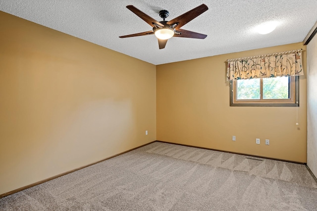 1010 Zanzibar Ln N, Plymouth, MN 55447 - empty room featuring a ceiling fan, carpet floors, and a textured ceiling