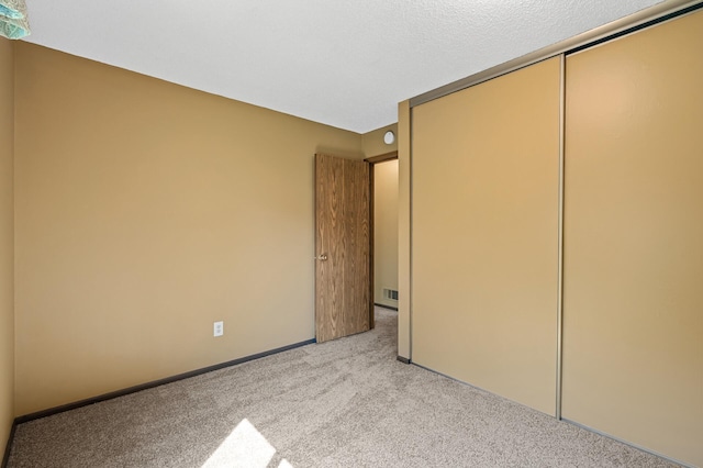 1010 Zanzibar Ln N, Plymouth, MN 55447 - unfurnished bedroom featuring carpet flooring and a closet
