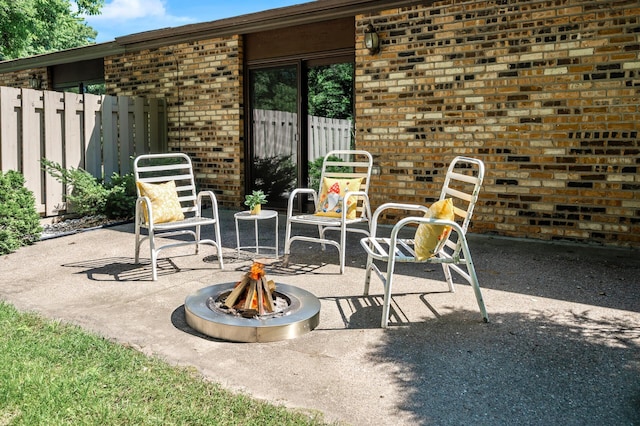 1010 Zanzibar Ln N, Plymouth, MN 55447 - view of patio / terrace with an outdoor fire pit