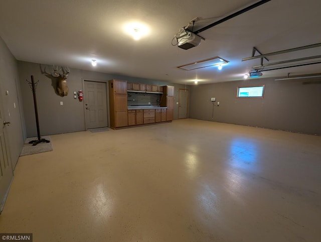 506 6th St SE, Little Falls, MN 56345 - garage featuring a garage door opener