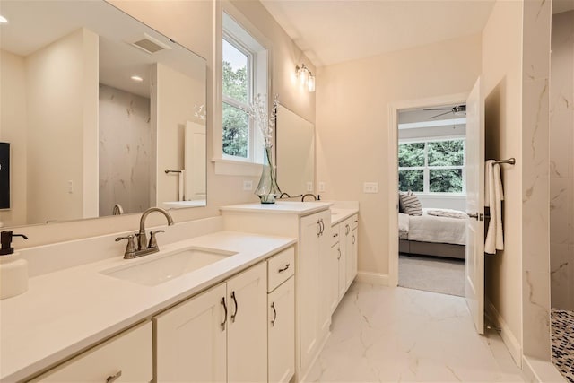 7396 Agate Trl, Inver Grove Heights, MN 55077 - ensuite bathroom with marble look tiles, vanity, a marble finish shower, a ceiling fan, and recessed lighting