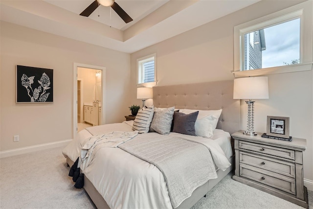 7396 Agate Trl, Inver Grove Heights, MN 55077 - bedroom with carpet floors, connected bathroom, and a tray ceiling