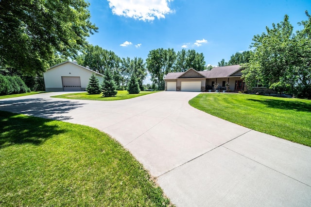 1322 Frontier Rd SE, Salem Twp, MN 55920 - ranch-style home with a front lawn and a garage