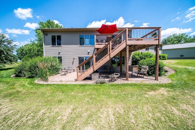 1322 Frontier Rd SE, Salem Twp, MN 55920 - rear view of property featuring a patio area, stairway, a deck, and a yard