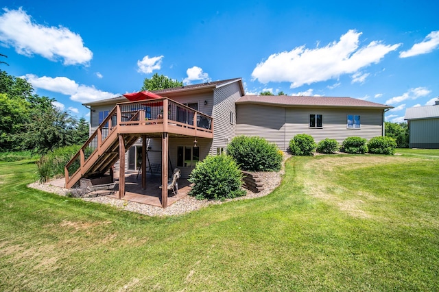 1322 Frontier Rd SE, Salem Twp, MN 55920 - back of house featuring a wooden deck, a patio, a yard, and stairs