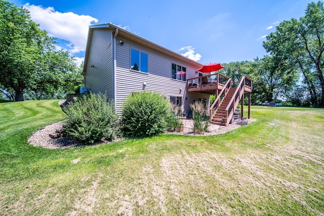 1322 Frontier Rd SE, Salem Twp, MN 55920 - rear view of property with stairs, a deck, and a yard