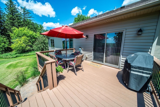 1322 Frontier Rd SE, Salem Twp, MN 55920 - wooden terrace with outdoor dining space, a lawn, and area for grilling