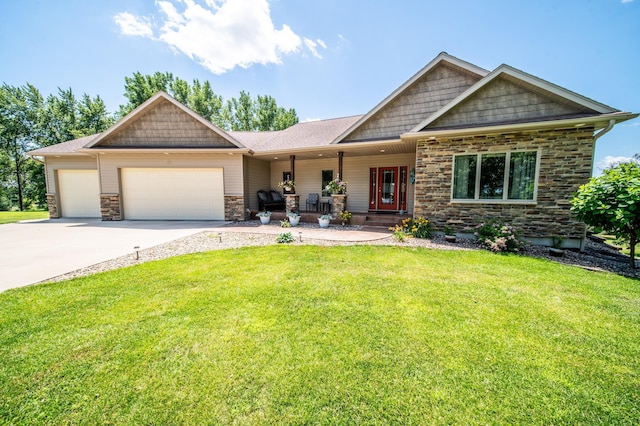 1322 Frontier Rd SE, Salem Twp, MN 55920 - craftsman-style home with stone siding, a garage, concrete driveway, and covered porch