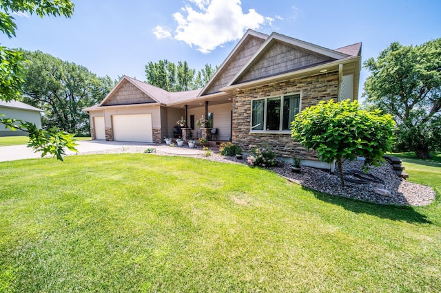 1322 Frontier Rd SE, Salem Twp, MN 55920 - craftsman house featuring stone siding, an attached garage, a front lawn, concrete driveway, and a porch