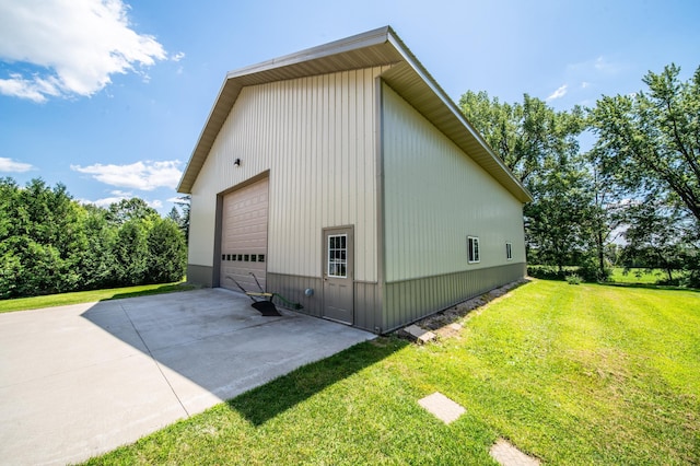 1322 Frontier Rd SE, Salem Twp, MN 55920 - view of side of home with a yard, a garage, and an outbuilding