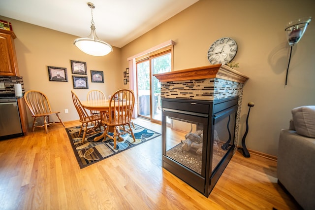 1322 Frontier Rd SE, Salem Twp, MN 55920 - dining area featuring light wood-style flooring and baseboards