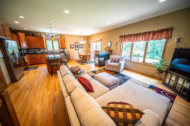 1322 Frontier Rd SE, Salem Twp, MN 55920 - living area featuring recessed lighting and light wood-style flooring