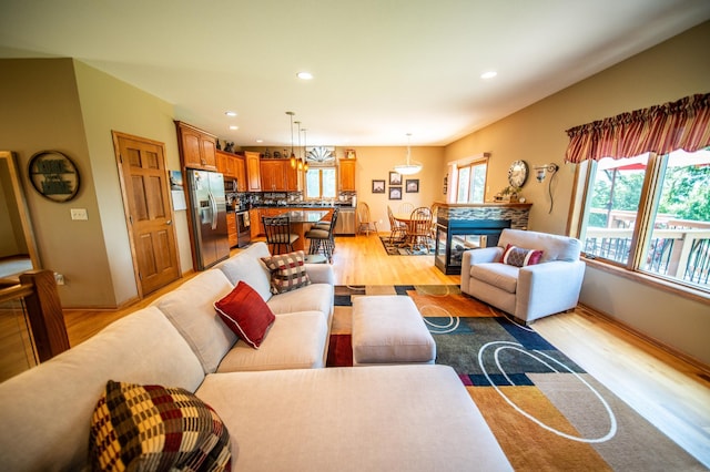 1322 Frontier Rd SE, Salem Twp, MN 55920 - living room featuring light wood finished floors and recessed lighting