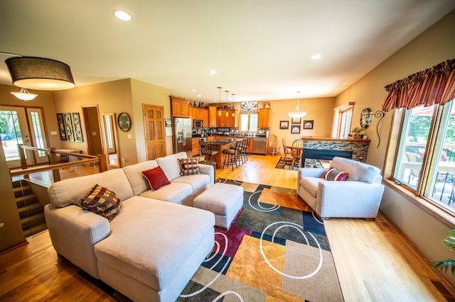 1322 Frontier Rd SE, Salem Twp, MN 55920 - living area with light wood-style flooring, plenty of natural light, and recessed lighting