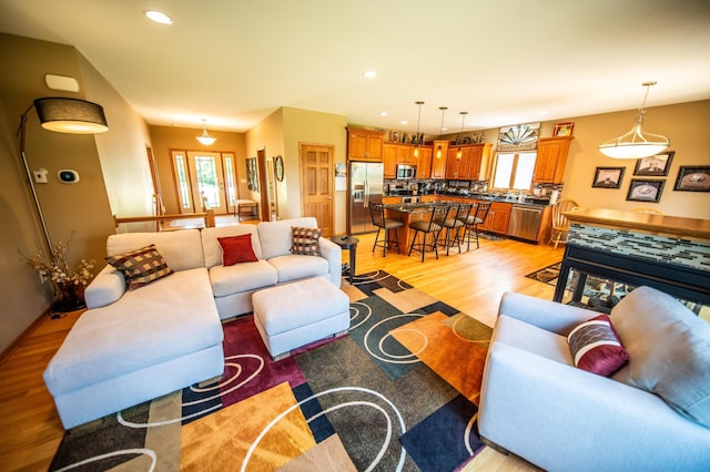 1322 Frontier Rd SE, Salem Twp, MN 55920 - living room featuring light wood-style flooring, healthy amount of natural light, and recessed lighting