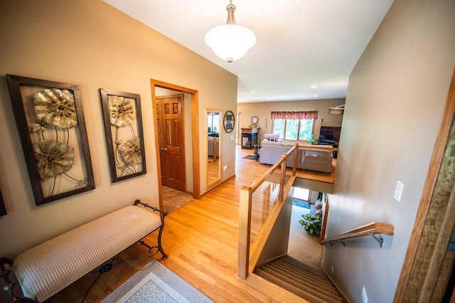 1322 Frontier Rd SE, Salem Twp, MN 55920 - hall featuring wood finished floors and an upstairs landing