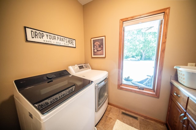 1322 Frontier Rd SE, Salem Twp, MN 55920 - laundry area featuring washer and dryer and baseboards