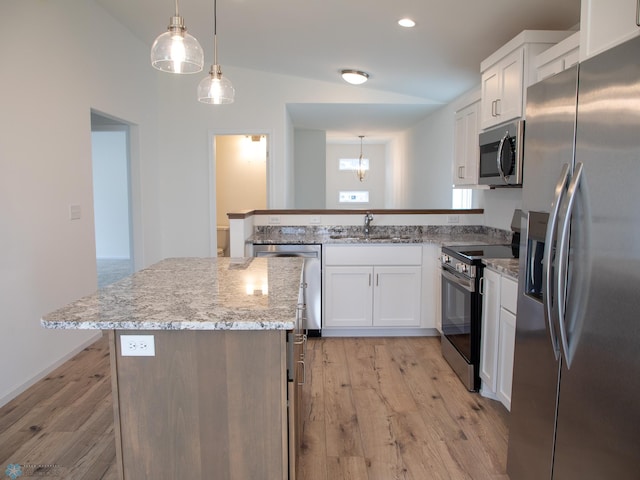 7891 Lost River Rd, Horace, ND 58047 - kitchen featuring stainless steel appliances, a peninsula, light wood-type flooring, white cabinetry, and light stone countertops