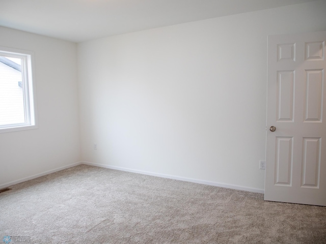 7891 Lost River Rd, Horace, ND 58047 - empty room with carpet flooring and baseboards