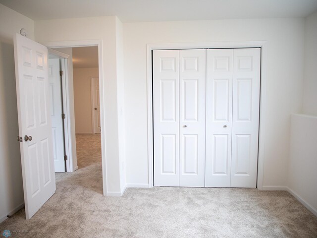7891 Lost River Rd, Horace, ND 58047 - unfurnished bedroom with carpet floors and a closet