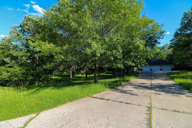 1012 Maple Ridge Ct NW, Northern Twp, MN 56601 - obstructed view of property featuring a garage