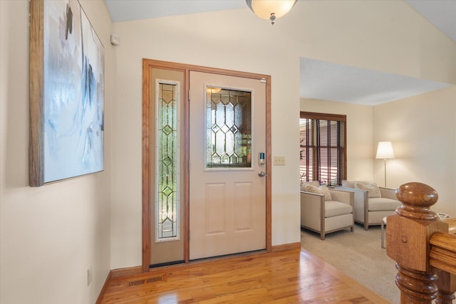6961 Meadow Ct, Centerville, MN 55038 - foyer entrance with light wood-style flooring and baseboards