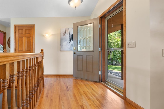 6961 Meadow Ct, Centerville, MN 55038 - foyer with baseboards and light wood finished floors
