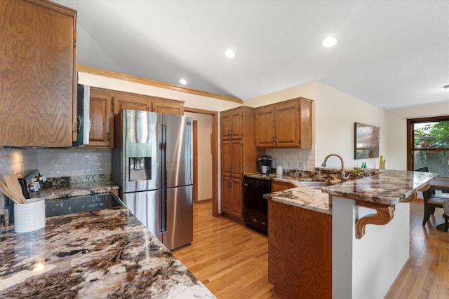 6961 Meadow Ct, Centerville, MN 55038 - kitchen featuring stainless steel fridge, dishwasher, a peninsula, electric range, and light wood finished floors