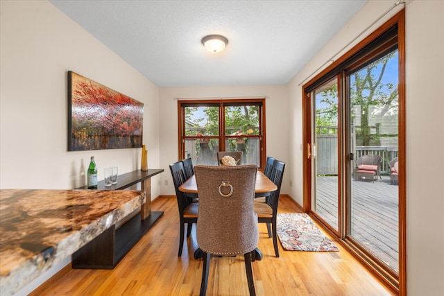 6961 Meadow Ct, Centerville, MN 55038 - dining area featuring light wood-style floors