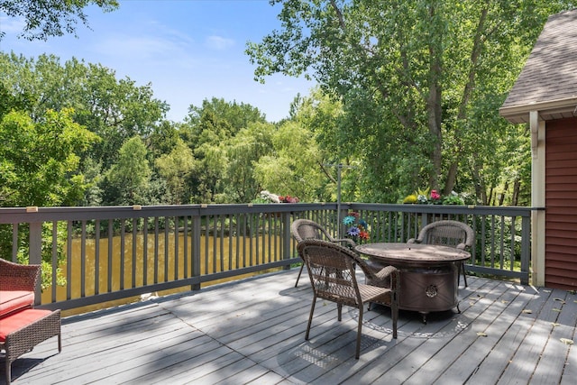 6961 Meadow Ct, Centerville, MN 55038 - wooden terrace with outdoor dining area